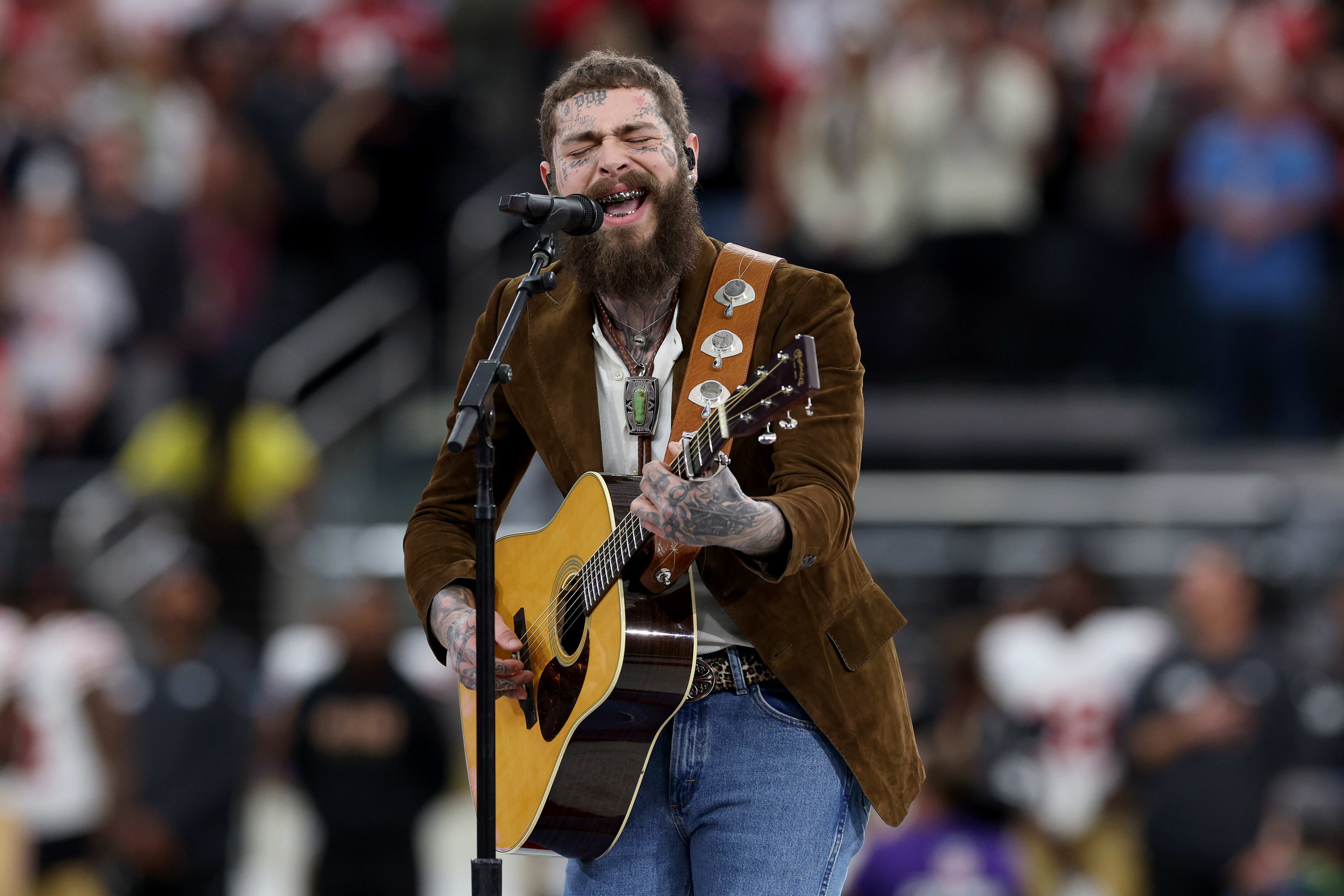 LAS VEGAS, NEVADA - FEBRUARY 11: American rapper and singer Post Malone performs prior to Super Bowl LVIII between the San Francisco 49ers and Kansas City Chiefs at Allegiant Stadium on February 11, 2024 in Las Vegas, Nevada. (Photo by Jamie Squire/Getty Images)
