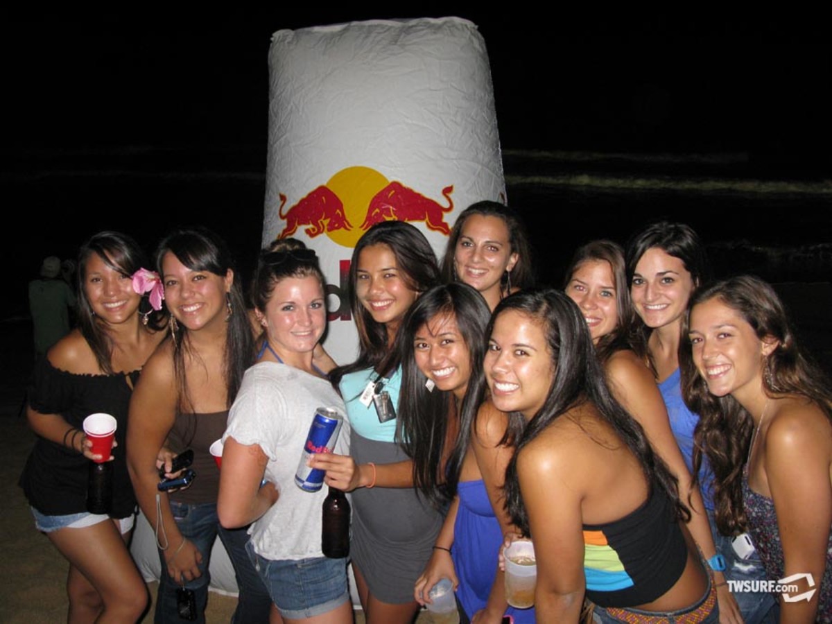 Red Bull Party While the party raged out of control in Jamie's front yard, the first ever "Red Bull After Dark" surf ession went down at Pipeline. These girls couldn't figure out which event to follow so they posted up on the beach. Photo: Coté
