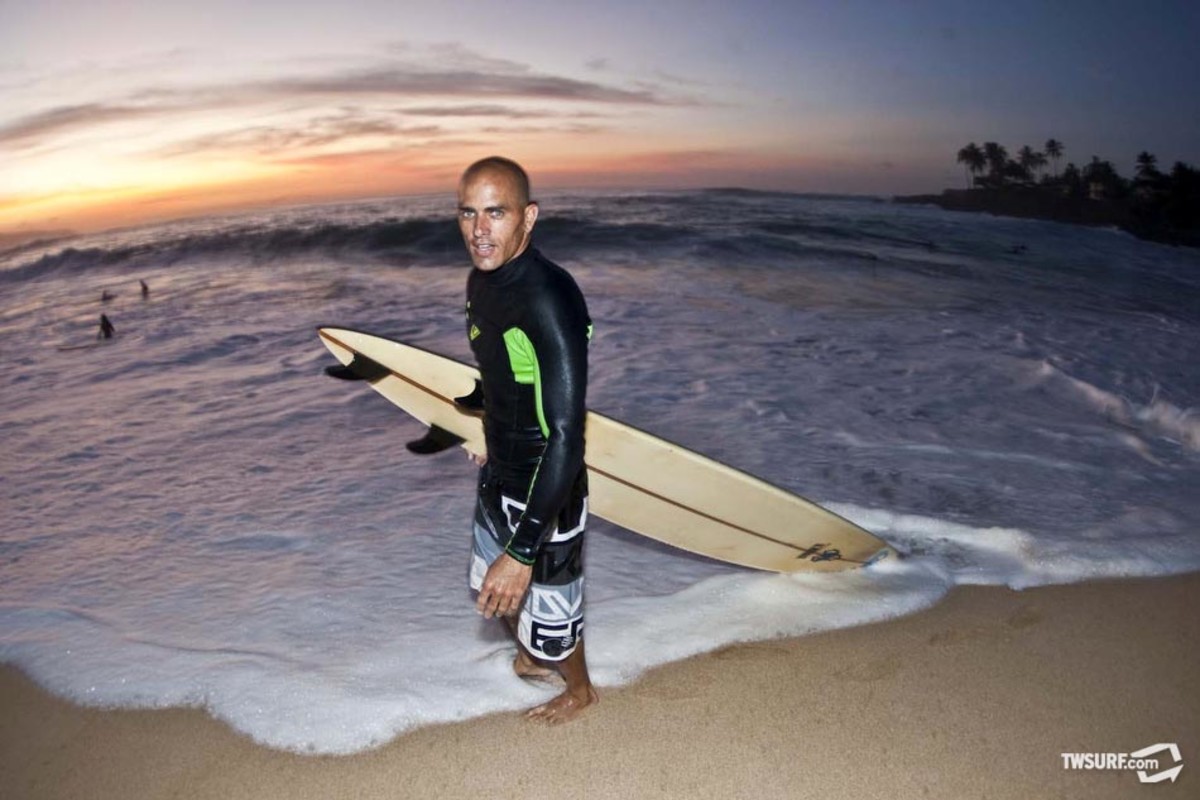 Kelly Slater At Waimea Bay Kelly Slater at Waimea Bay for the opening ceremonies of the Quiksilver In Memory Of Eddie Aikau Big Wave Invitational. Photo: Bielmann/SPL
