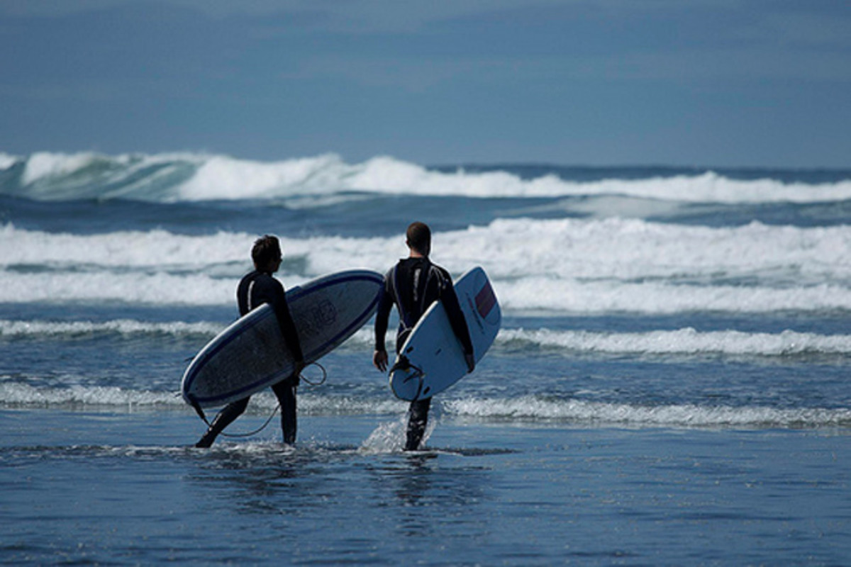 Hitting the waves at Seattle's closest surf destination—Westhaven State Park; photo courtesy of Kitaro & Kiwauso