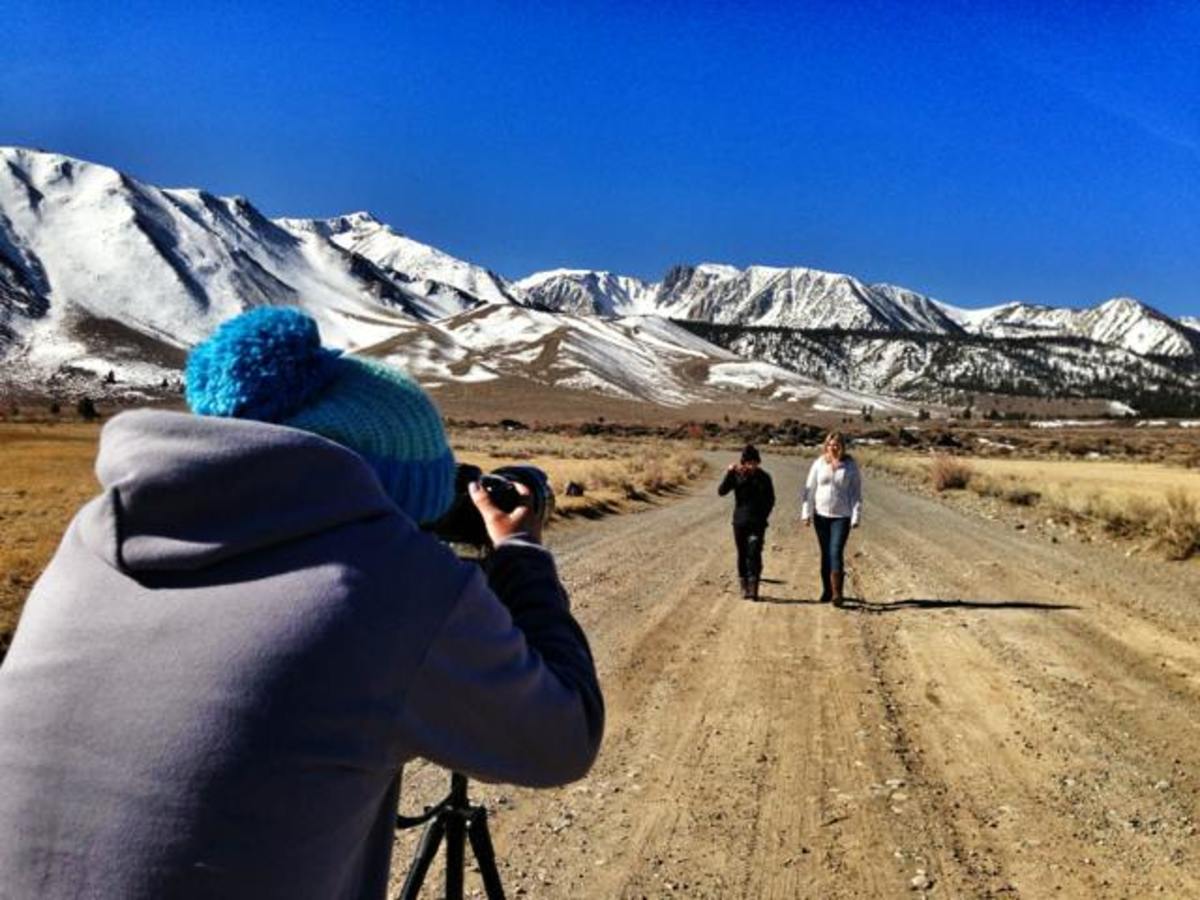 Behind the camera with Kim Woo, filming pro snowboarder Kimmy Fasani for a Boarding For Breast Cancer video; image by Kim Woo