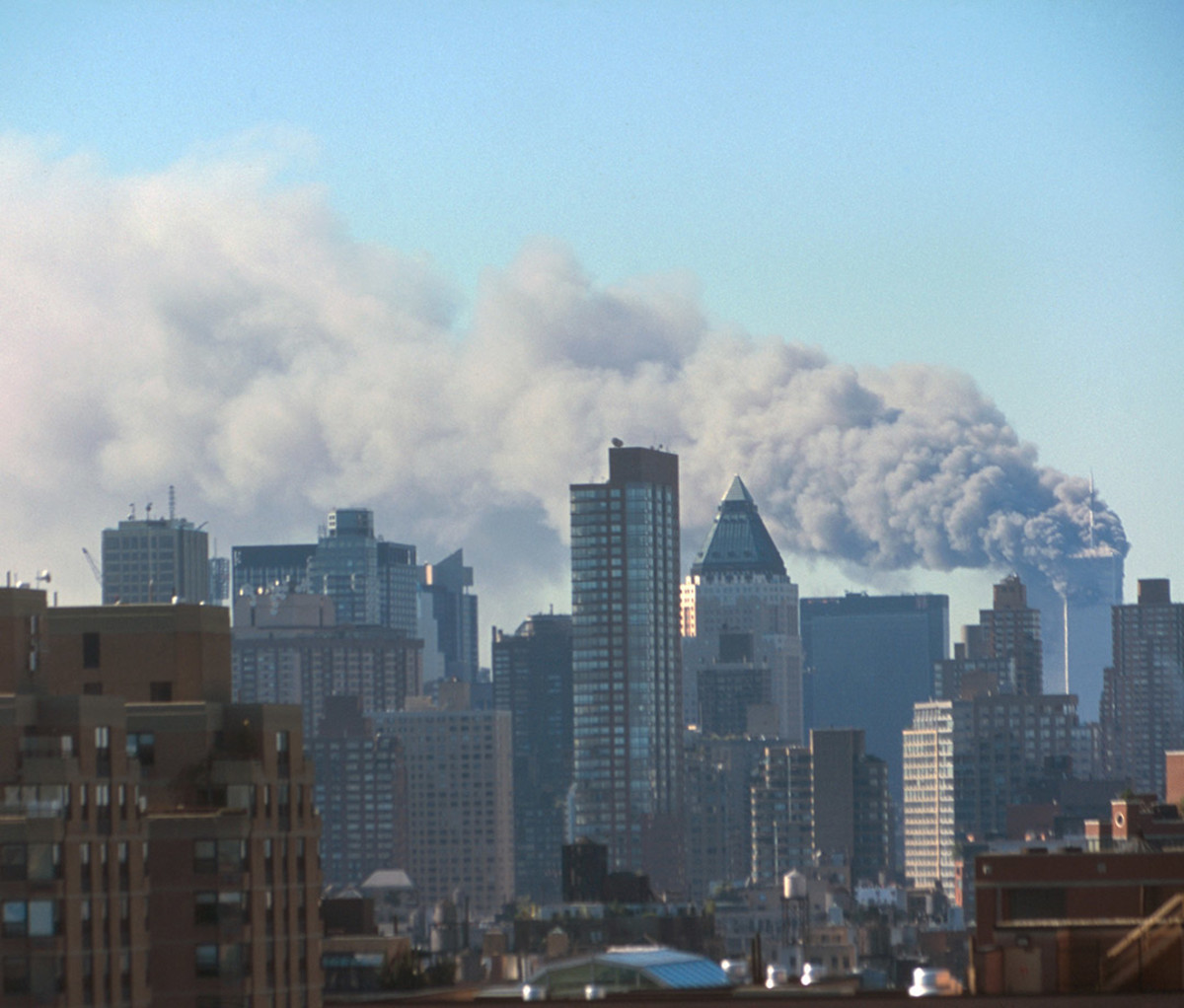 Smoke billowing from the Twin Towers in a photo taken from Midtown