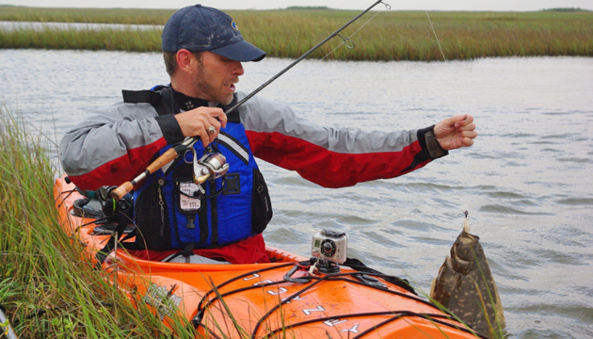 Jeff Herman wears a seat belt and sometimes paddles a - gasp - sit-inside. Stunt fish? You decide.