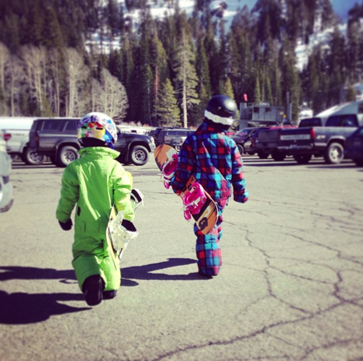 Getting your kids snowboarding and skiing: One piece snowsuits like these from Burton making suiting up a breeze for even the littlest of shredders. Photo by Lee Crane. 