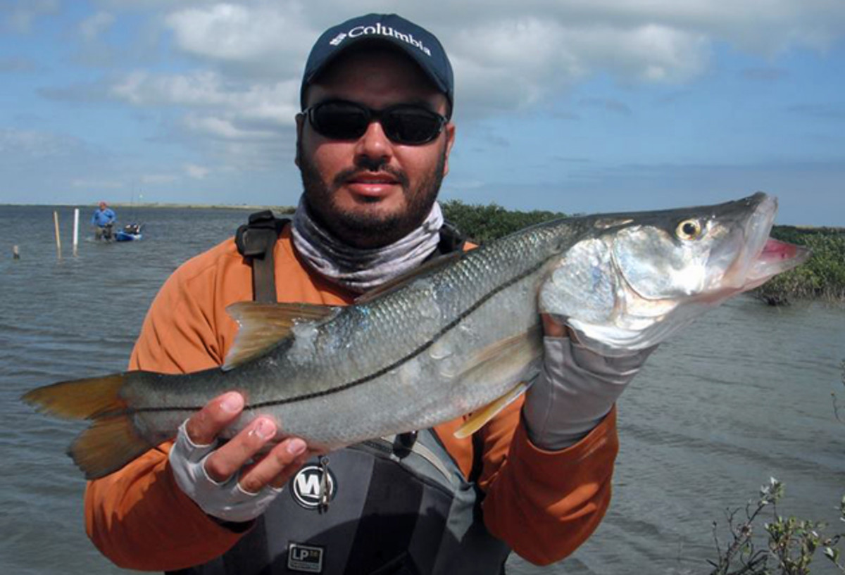 Carlos Villarreal with a South Bay snook.