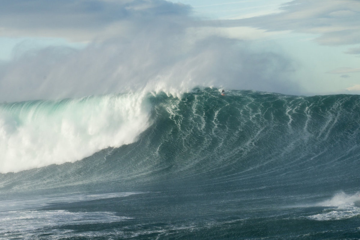 Look closely at the top of this wave and you'll see Shane Dorian backing away. Dorian is a winner of multiple Billabong XXL awards, and was hoping to bag another one here, but couldn't muster the paddle speed. Photo: Alex Laurel