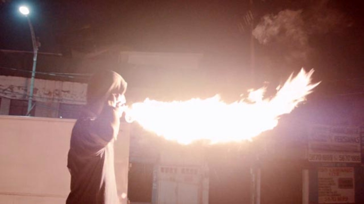 Skateboarding in Mexico City can lead to all kinds of unusual sights, like a fire breathing street performer; frame grab courtesy Coalatree Organics