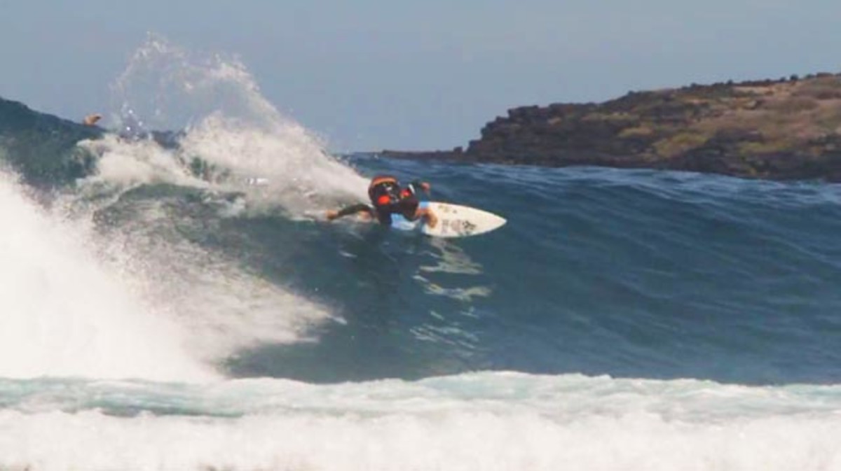 Reunion Island surfer Jorgann Couzinet at St. Leu, a world famous surf spot on Reunion; frame grab courtesy of Roundhouse Filming