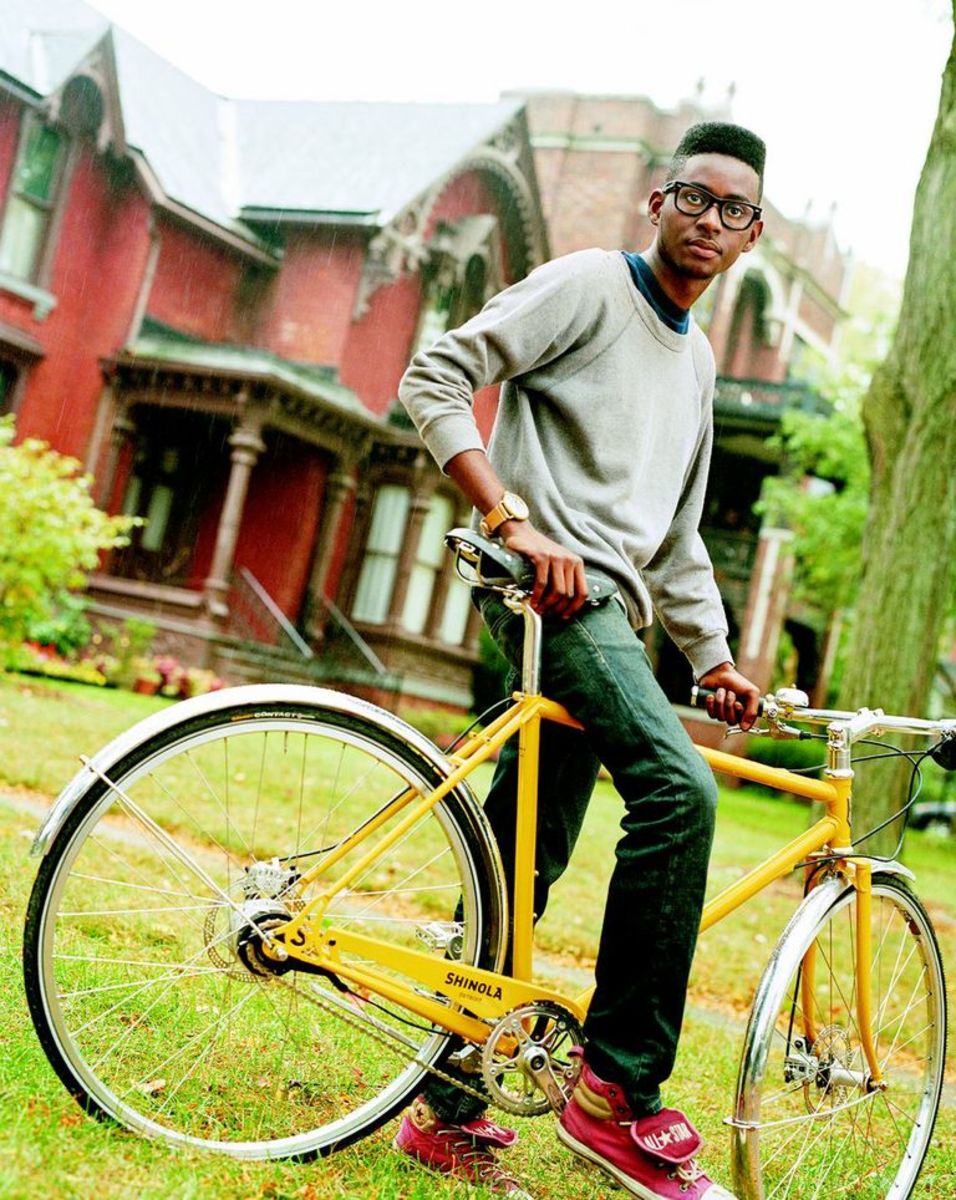 Shinola cycle and watch featured on local taking a ride through the neighborhood; Campaign courtesy of Bruce Weber