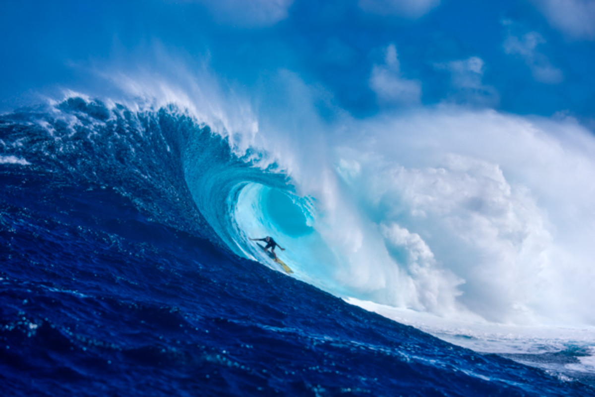 Luckiest Man Alive: Shane Dorian, one of the planet's most talented big wave prone surfers, hooks into another "accidental" Peahi barrel. Imagine what he might do if he got in earlier, already standing. Photo: Fred Pompermayer