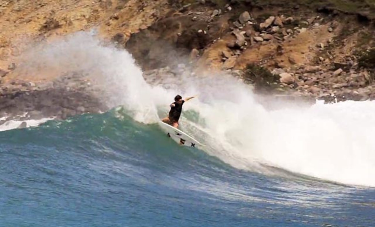 Michael Dunphy whips it around at one of the secret Caribbean surf spots; frame grab courtesy Surfing magazine
