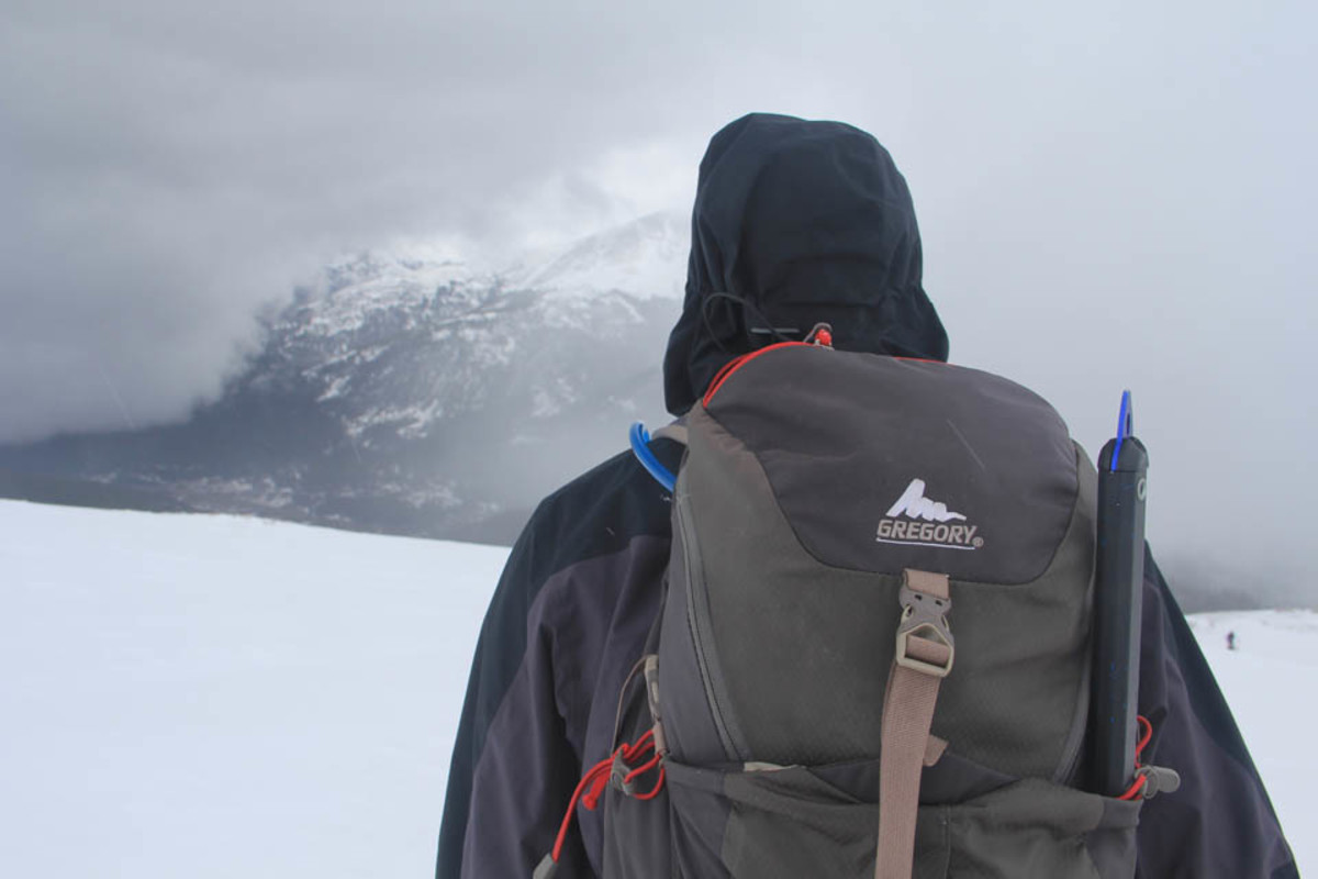 Be prepared with essentials like an insulating layer, rain shells, and a map and compass for any 14er attempt; Photo by Johnie Gall