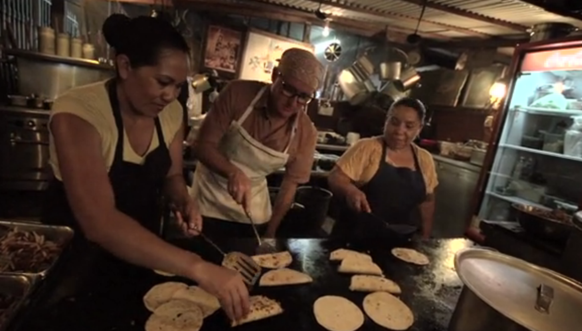 Your host, Chris Cote, trying and failing to cook at Hangman in San Jose Del Cabo. Photo: Daren Crawford