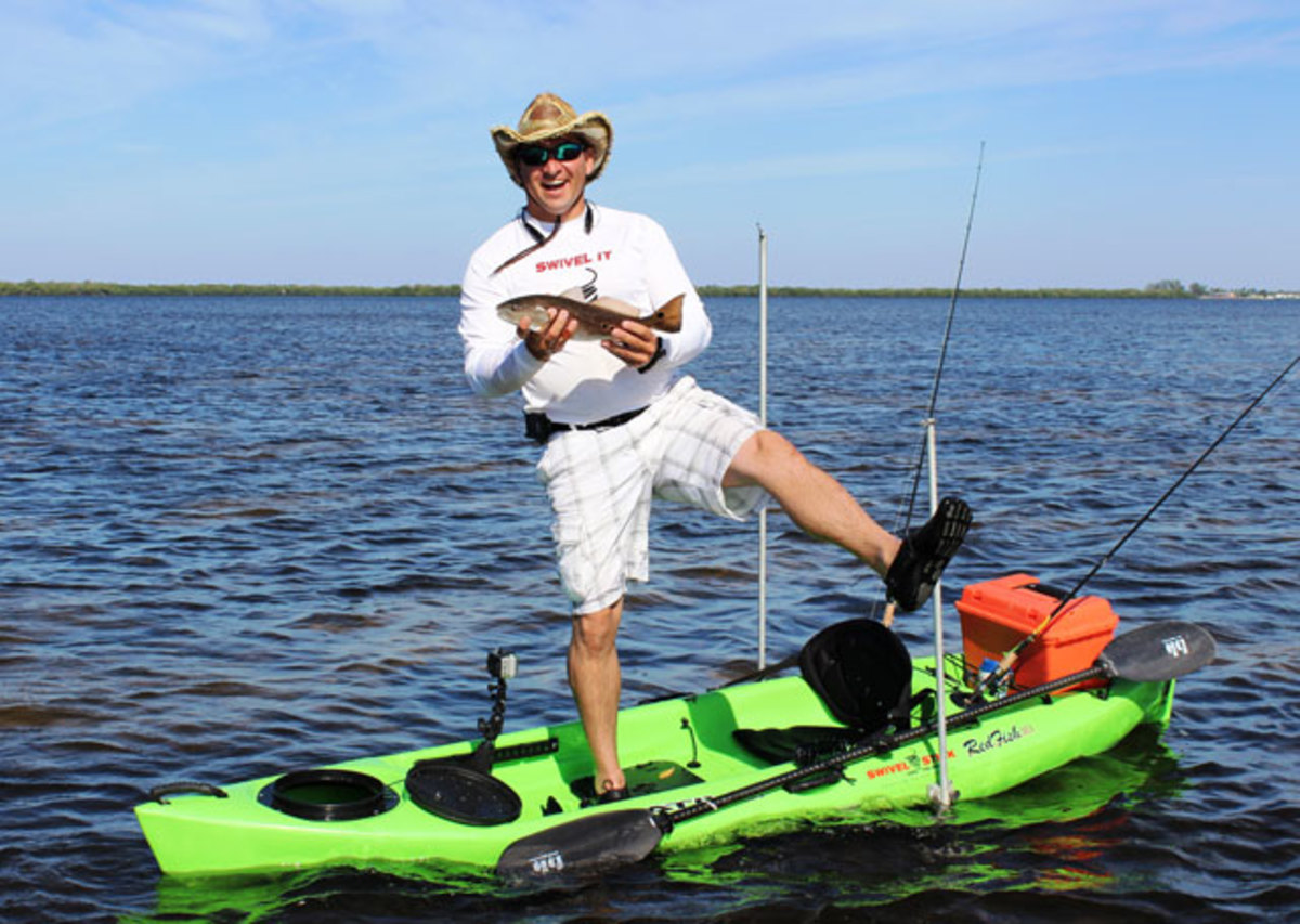 Locked in place: the Swivel Stick double-anchored on a slender kayak not typically used to stand.