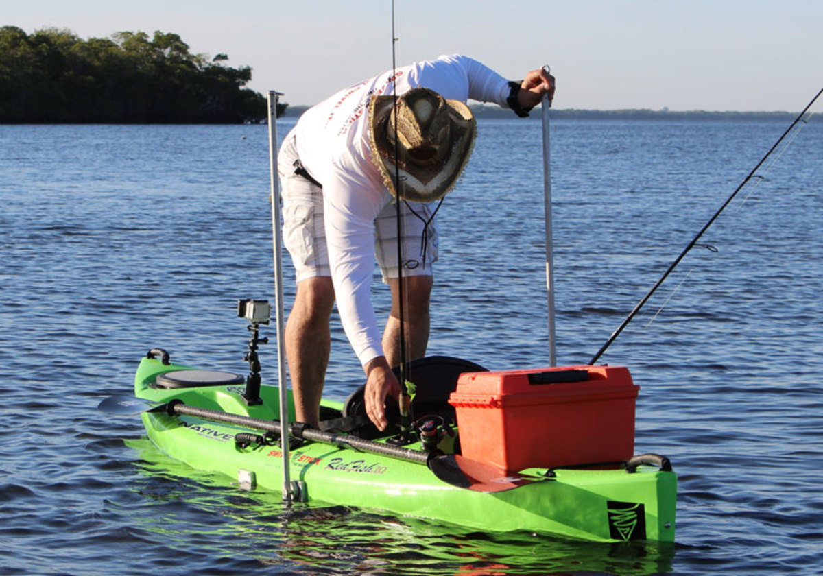 With two sticks in the bottom, a kayak anchored with a Swivel Stick is very stable.