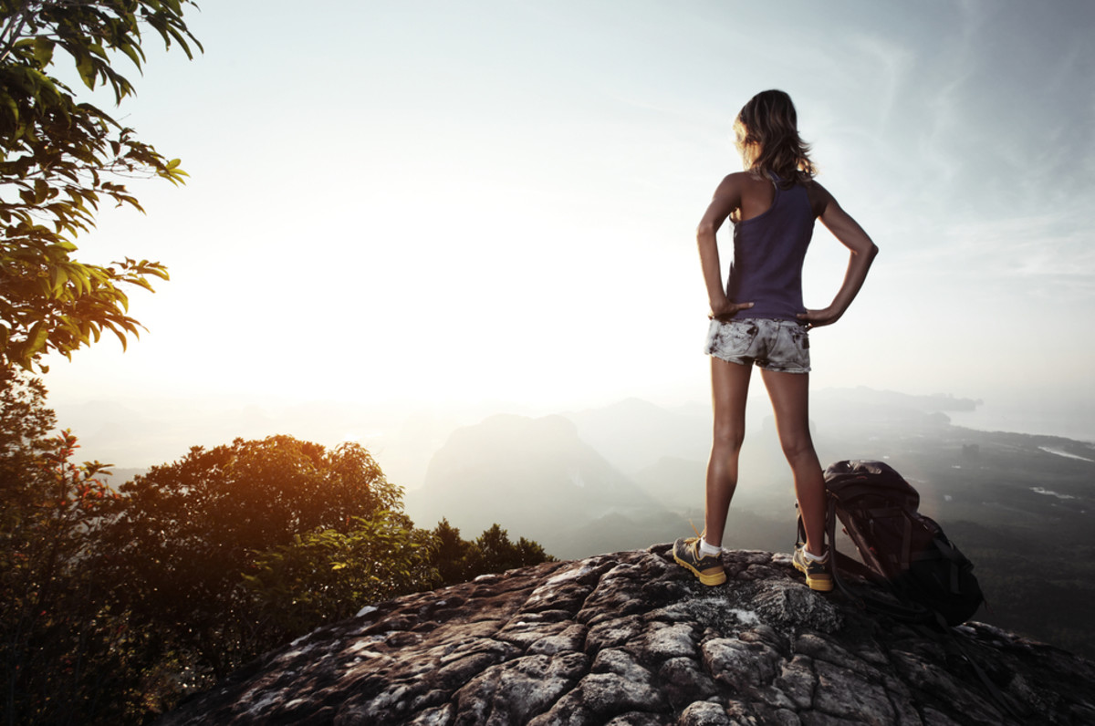 Reach the top of your next mountain without hitting the wall with any one of these five energy gels. Photo of girl on top of mountain courtesy of Shutterstock.com