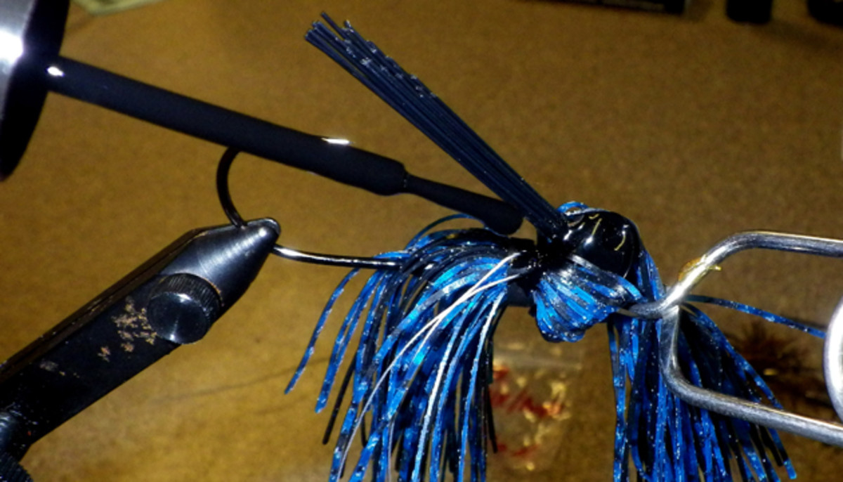 Tying the jig skirt ahead of the standard rubber collar plumps out the legs, giving them a livelier look in the water.