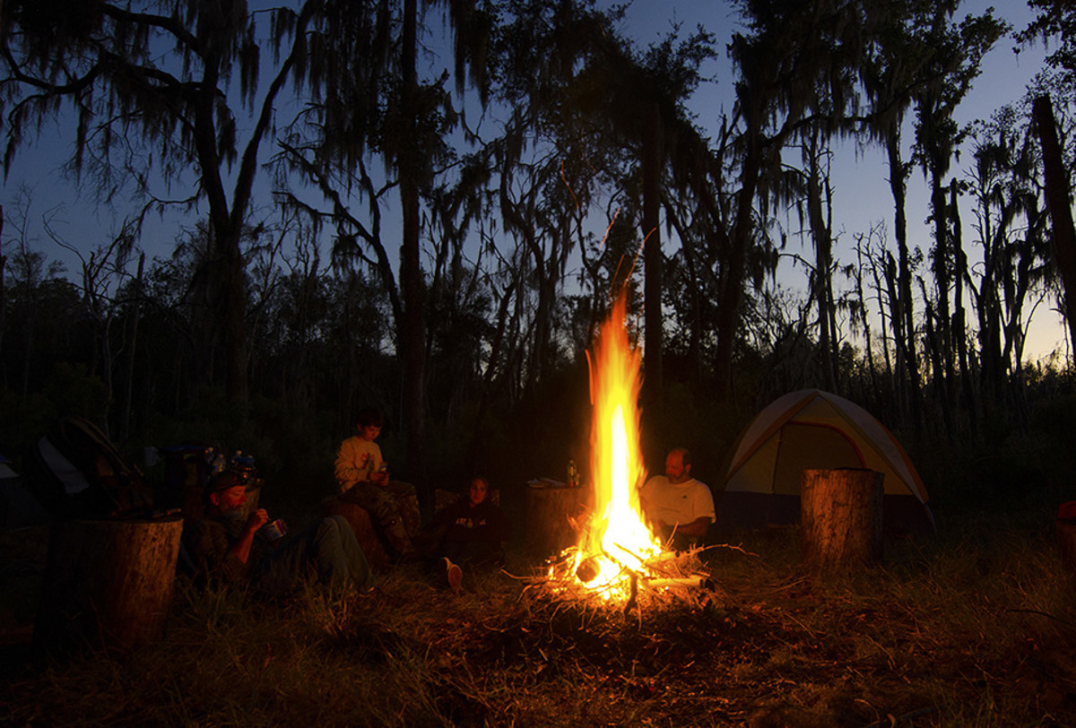 Enjoying the fire light on a scarce dry patch in the Okeefenokee.