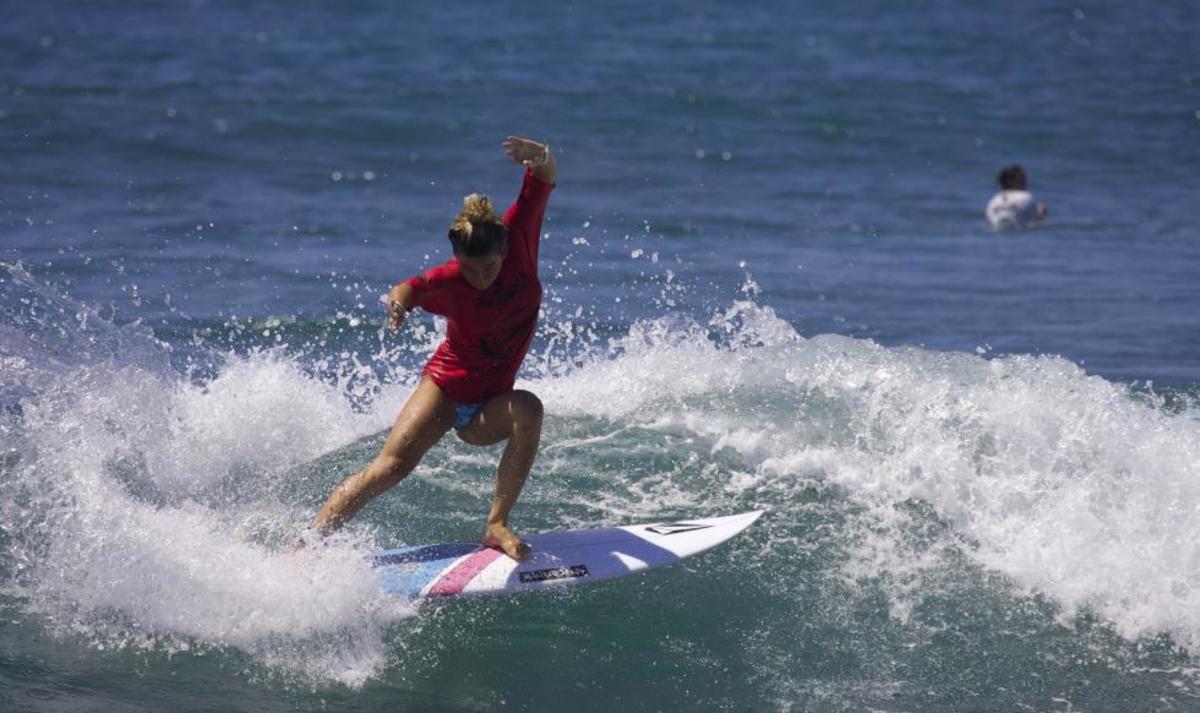 coco ho surfs naked