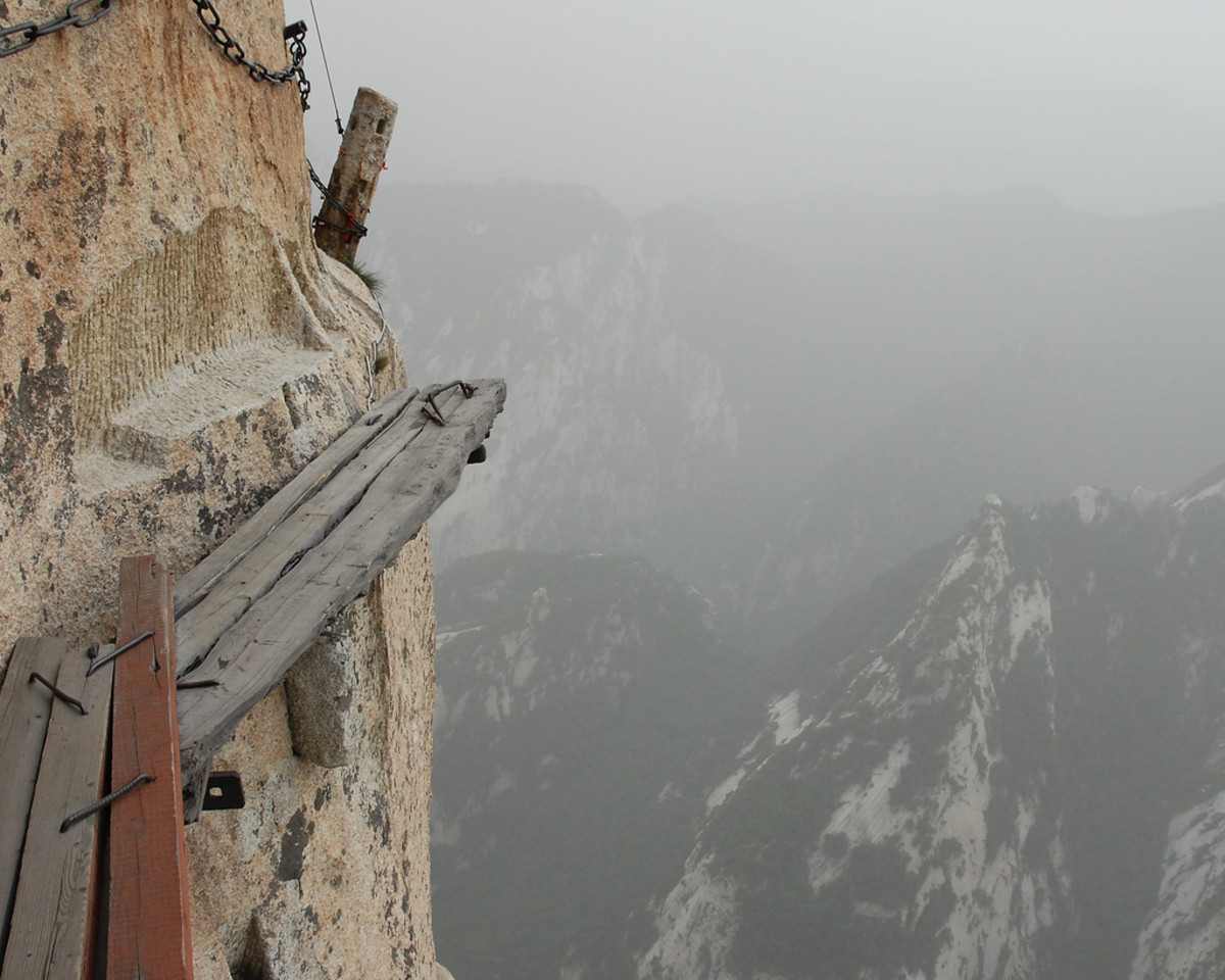 World's most dangerous hikes include the cliffside plank path on Mt. Huashan in China. Photo by Aaron Feen/Flickr