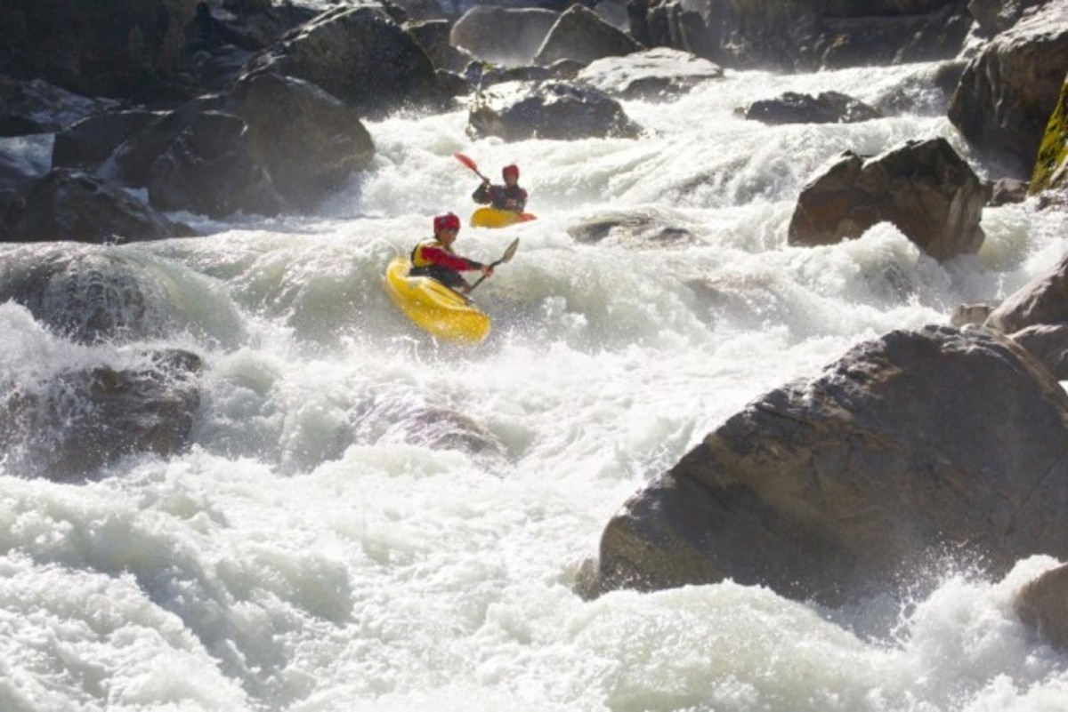 3 time champ Sam Sutton leads another paddler down the middle of the course. Photo by David Spiegel