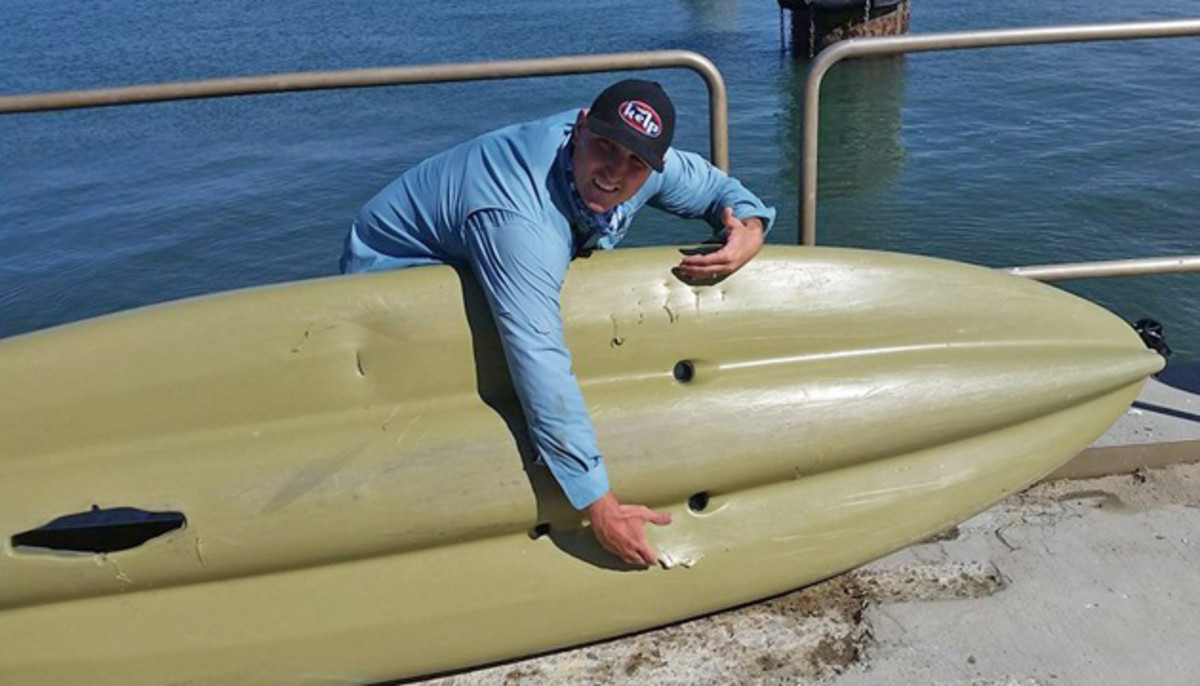 Ryan Howell's Hobie Outback sustained serious damage when a great white shark struck it in a breach attack, then returned for another bite. Photo courtesy Ryan Howell, Central Coast Kayak Fishing.