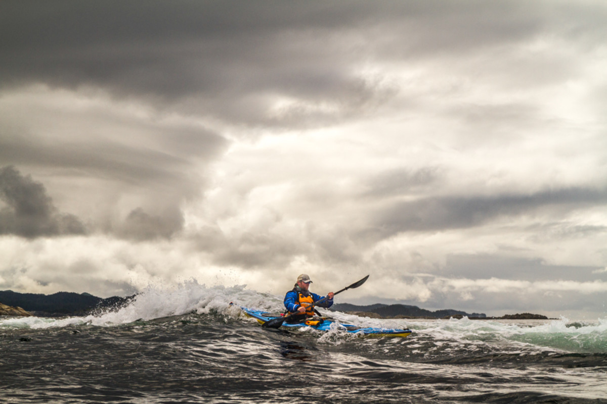 Paddler Nathaniel Stephens on the Pacific Coast of Chichagof Island. Photo taken from the kayak.