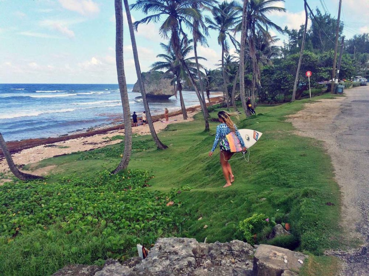Alessa Quizon taking a break from looking good in a bikini to do that other thing she's pretty good at—surf; Photo courtesy of Surfing Magazine