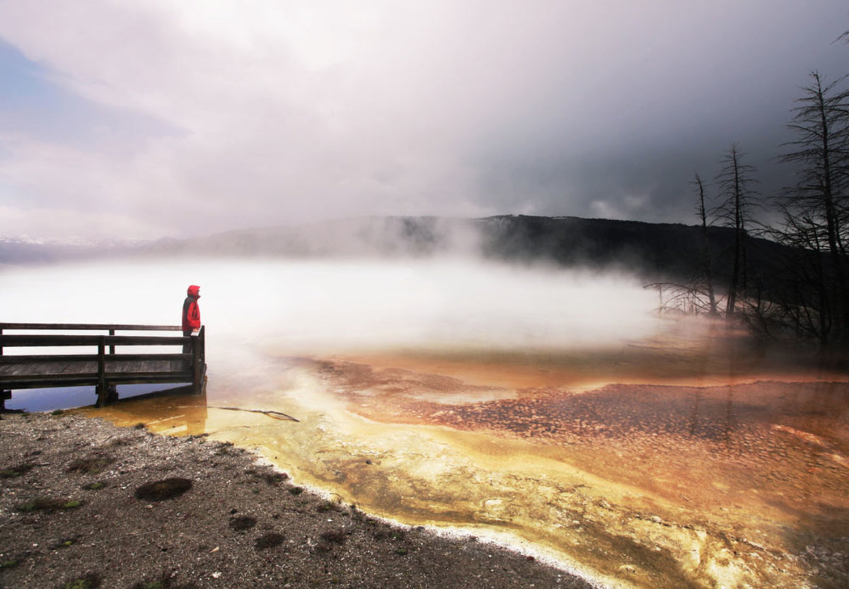 Enjoy fewer crowds at your favorite national park—like the notoriously busy Yellowstone— by visiting when there’s still some chill in the air; Photo courtesy of Shutterstock.com