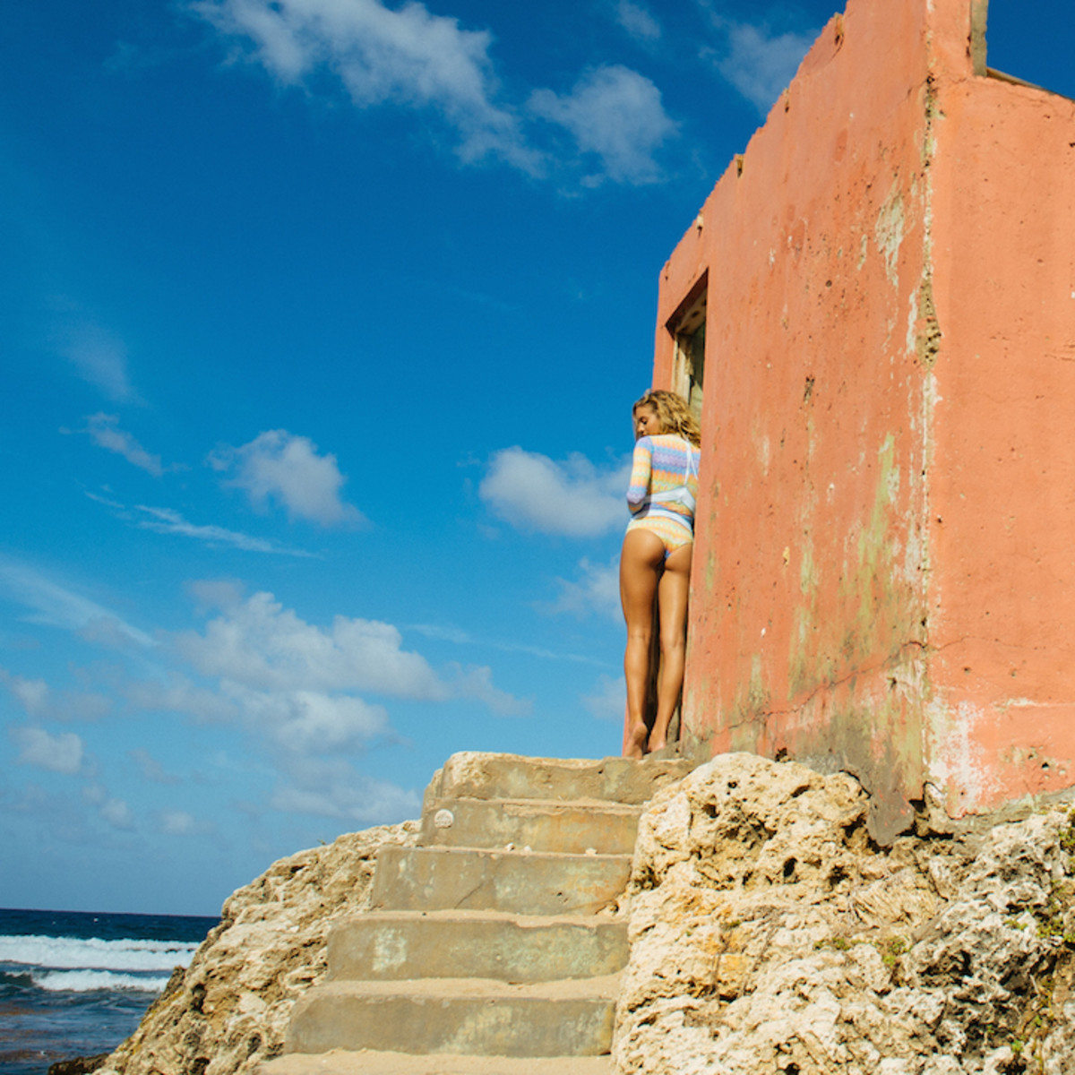 Surf darling Bree Kleintop models the 365 Hybrid Voda Surfsuit while in Barbados. Photo: Corey Wilson.