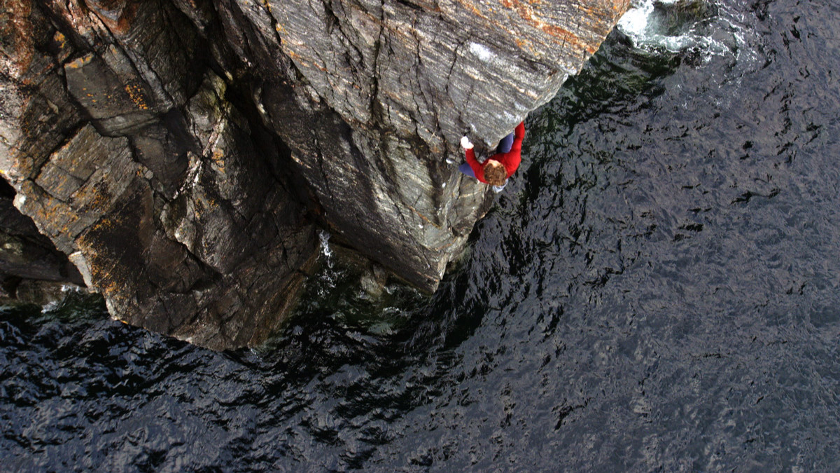 Julian Lines has been free solo climbing sheer cliffs without a rope for more than 25 years. Photo from Posing Productions/Caters News