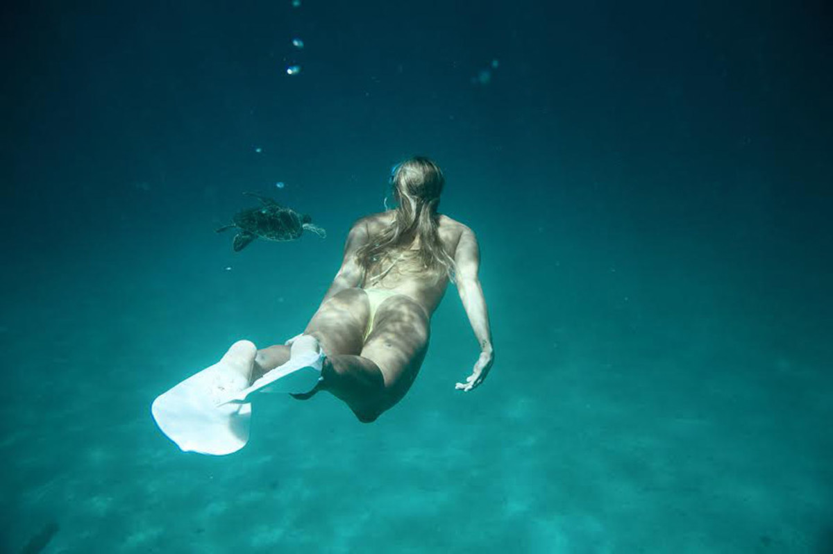 Four pro surfers subbed in as models for the 2015 Surfing magazine Swimsuit Issue; Photo by Corey Wilson