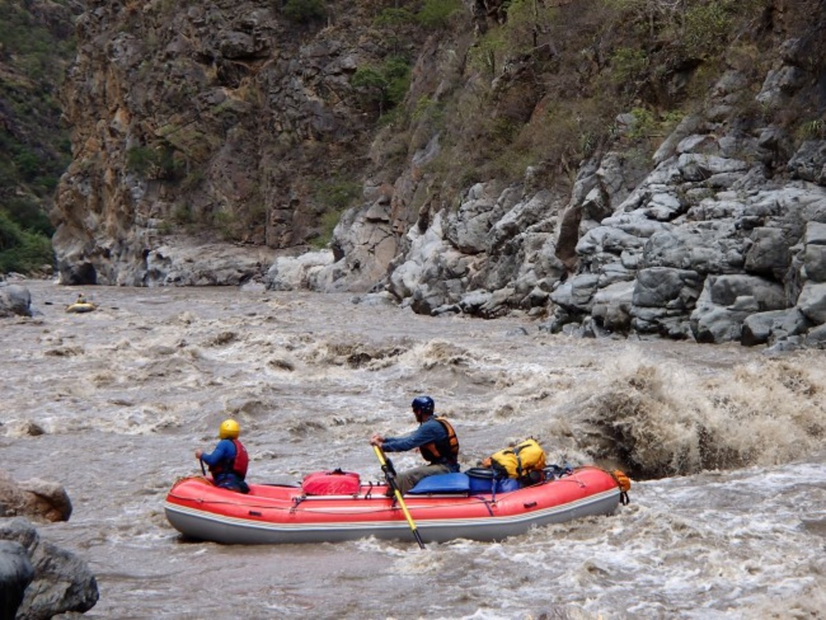 Californians Marty Acree and Ralph Menderhausen navigate their raft around a big wave in the lower part of Rupaybamba rapid in the Inner Gorge.