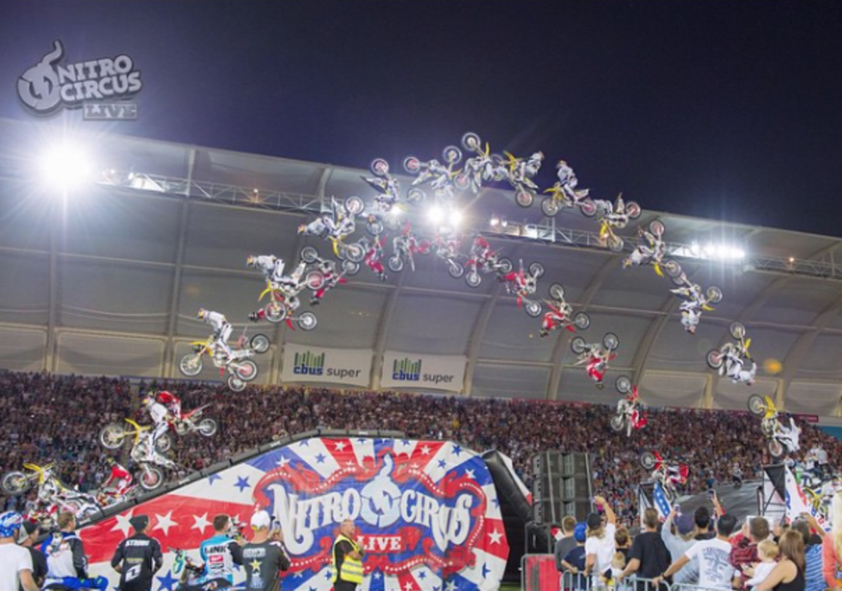Travis Pastrana, on the yellow bike, tried a double back flip side by side with Josh Sheehan but over-rotated. Photo courtesy of Nitro Circus