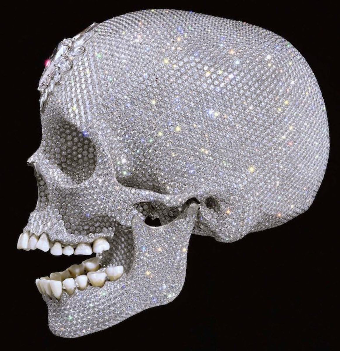 A whole lot more expensive, and just impossible to surf. Hirst's For The Love of God.