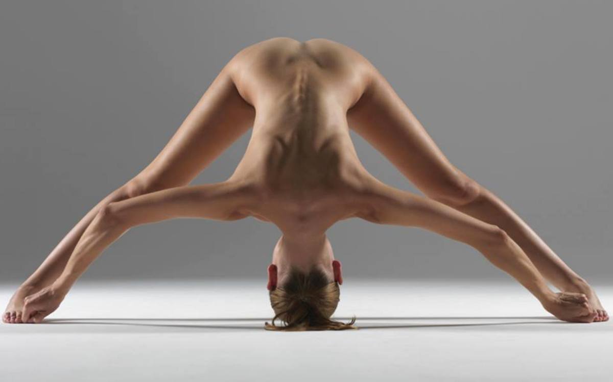 New photo exhibit elevates ancient practice of naked yoga to an art form |  Men's Journal