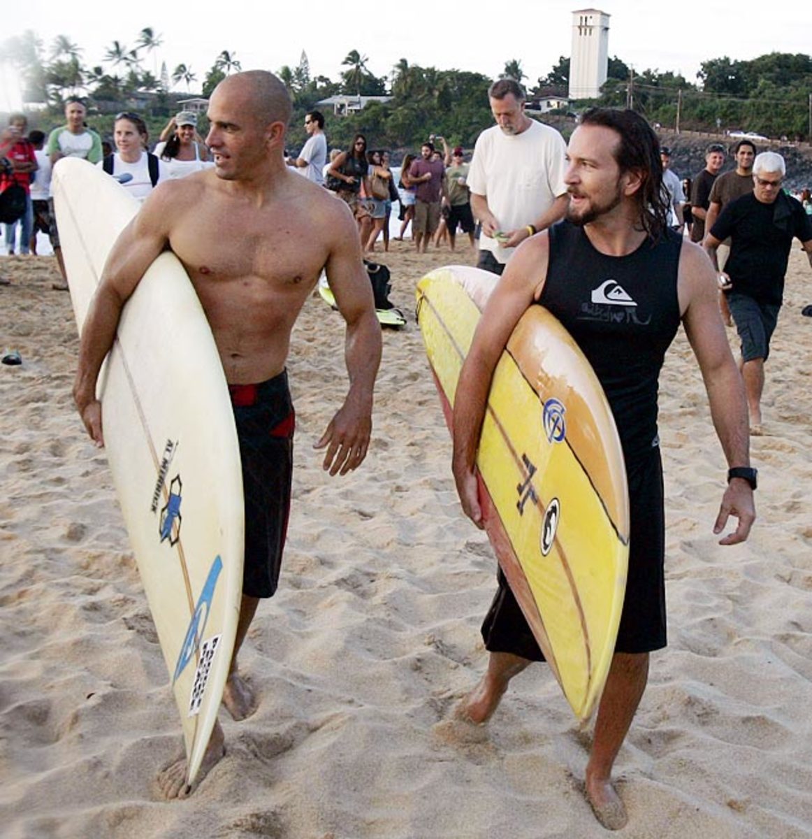 Kelly and Eddie prepare for the paddle out of the Eddie Aikau opening ceremony. Photo by Quiksilver