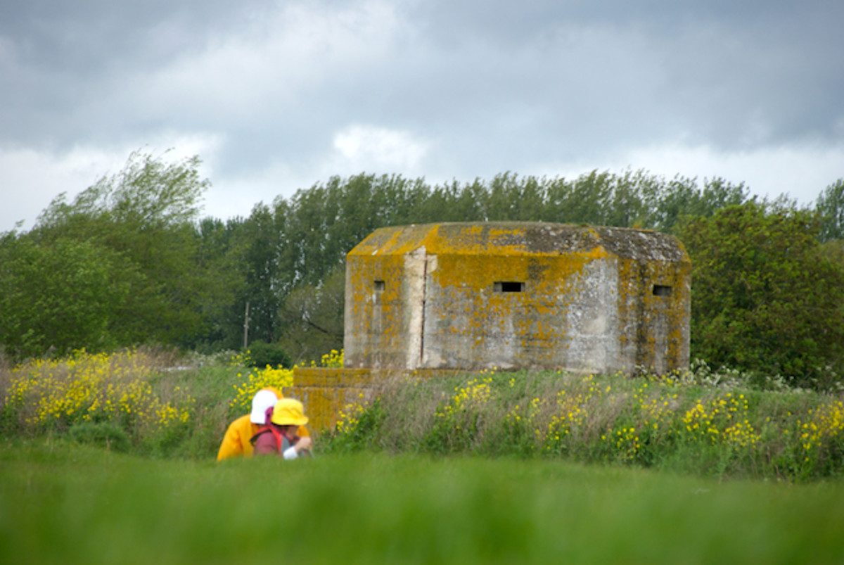 Paddling past a pillbox on the River Thames, part of Churchill's "Stopline Red."