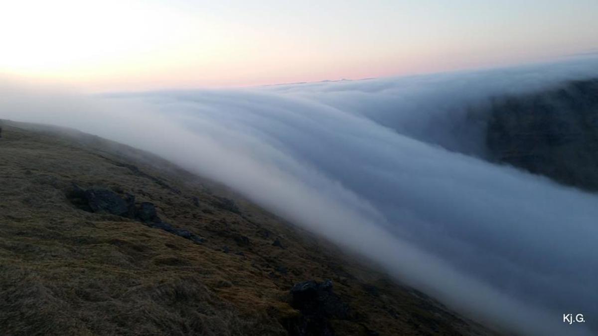 Bizarre weather phenomenon in Iceland appears as a waterfall of fog. Photo: Kjartan Gunnsteinsson