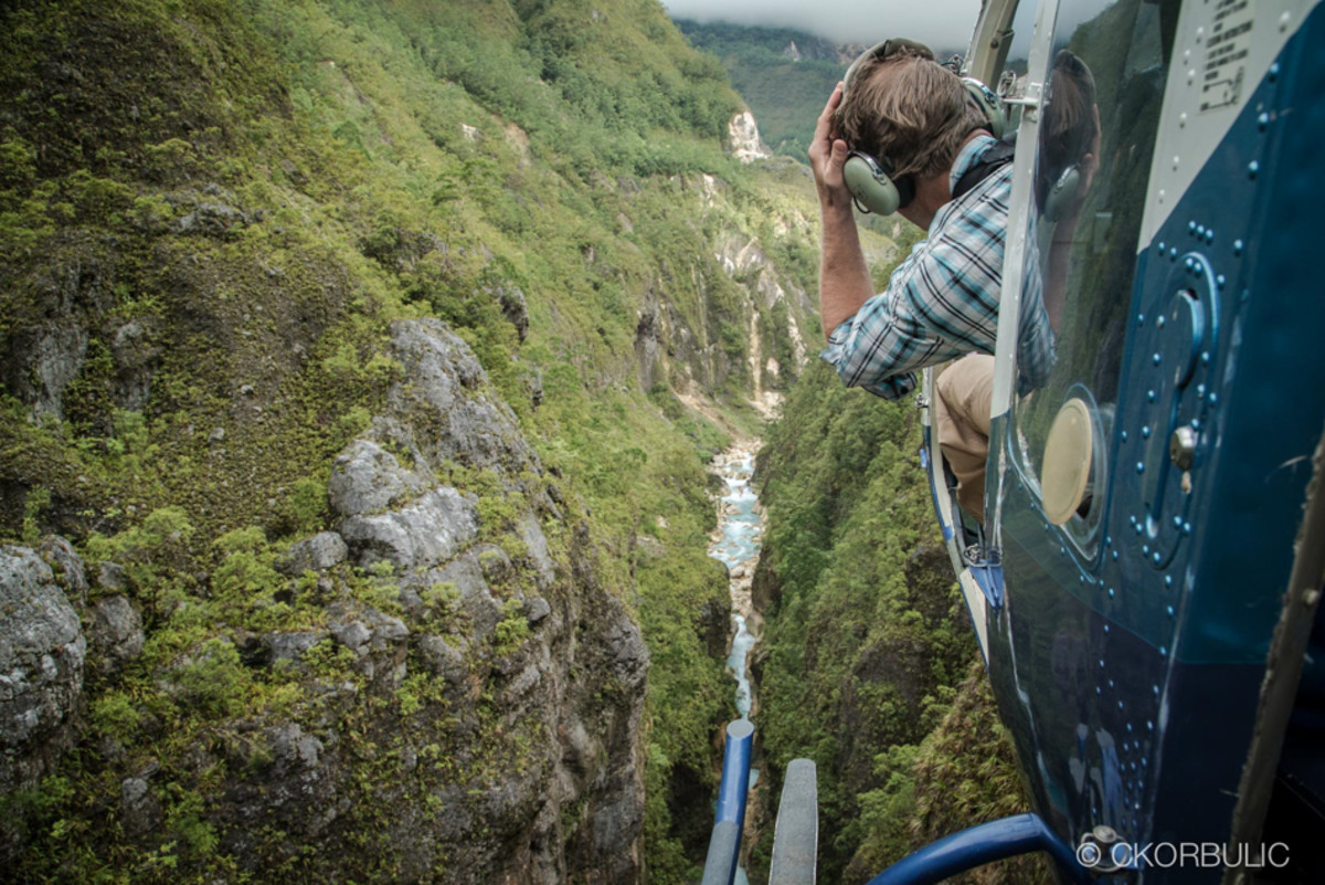 Ben Stookesberry on the heli scout. The heli scout almost raised more questions than it answered, leaving us contemplating the gravity of the river-level situation for days. Photo by Chris Korbulic