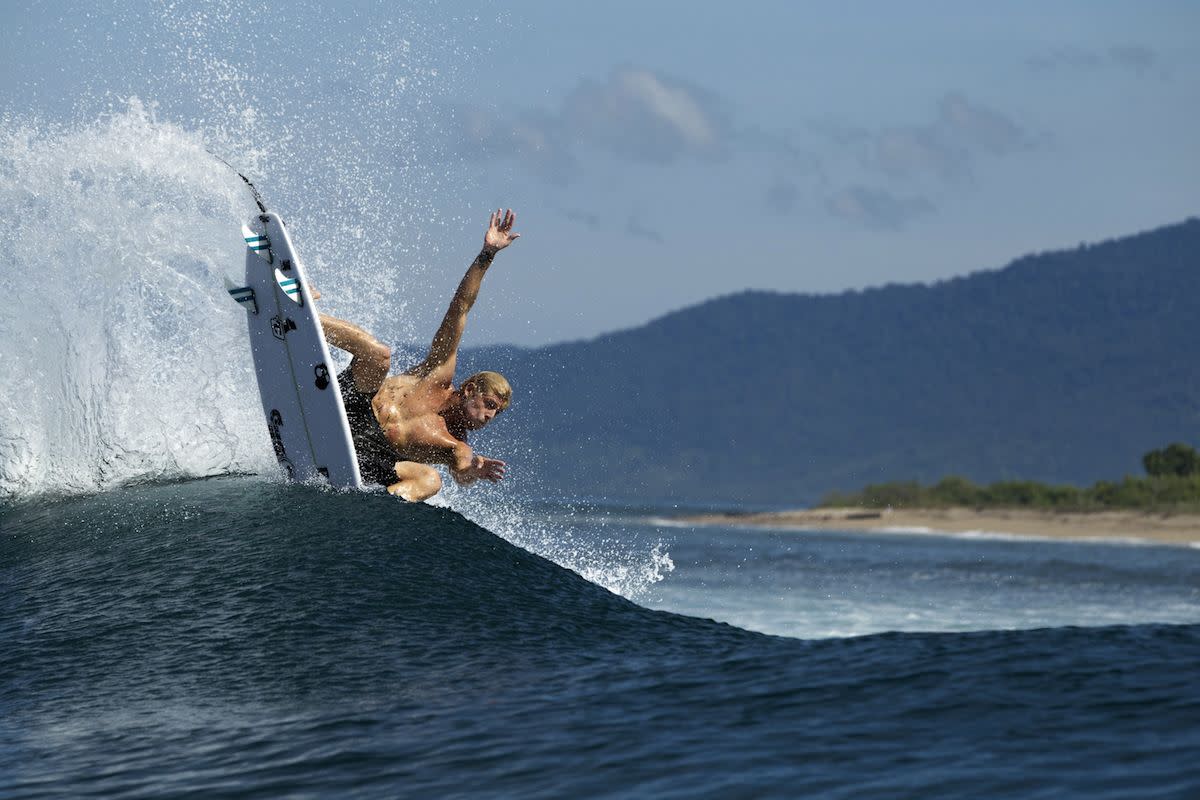 Different sports, different muscles. Mick off the fitness ball and into the waves. Photo by Red Bull