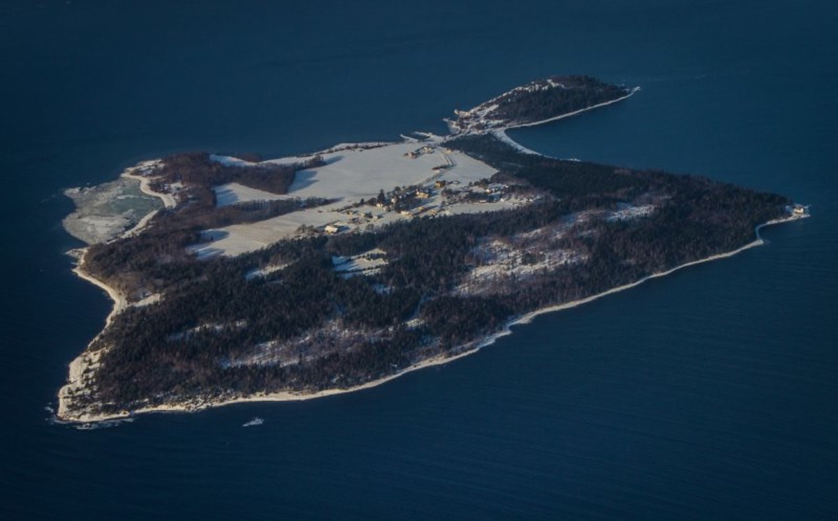 Bastoy Island prisoner escape Norway Norweigan surfs surfboard paddle