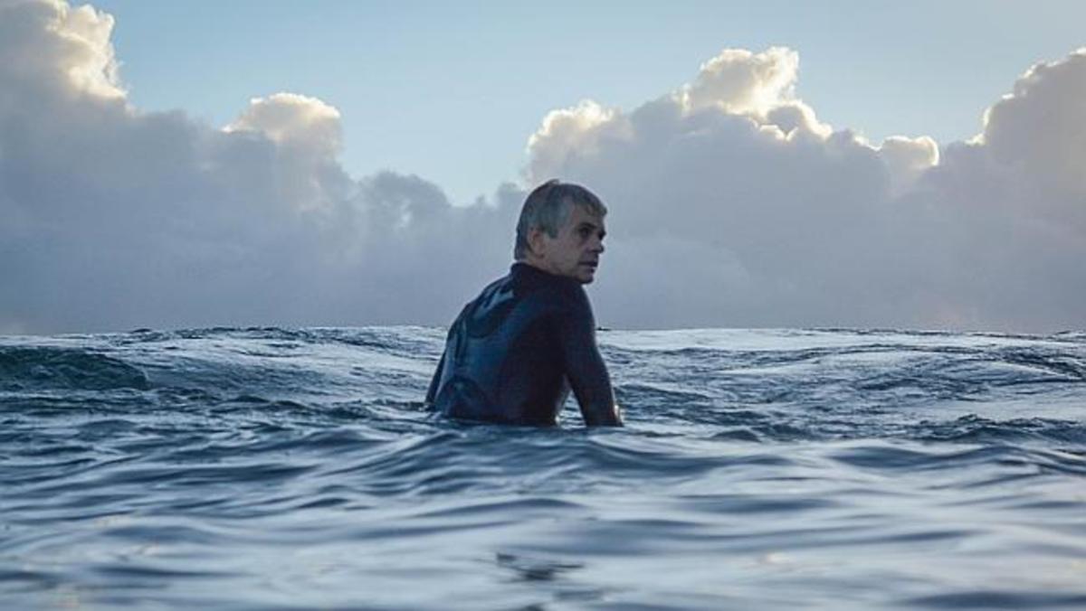 Craig Ison surfing