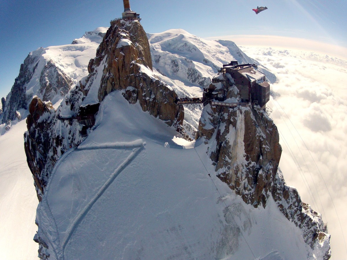 A flight in Chamonix. Threading the needle, the wingsuit fliers flew underneath the bridge at Aiguille du midi. Photo: Wingmen.