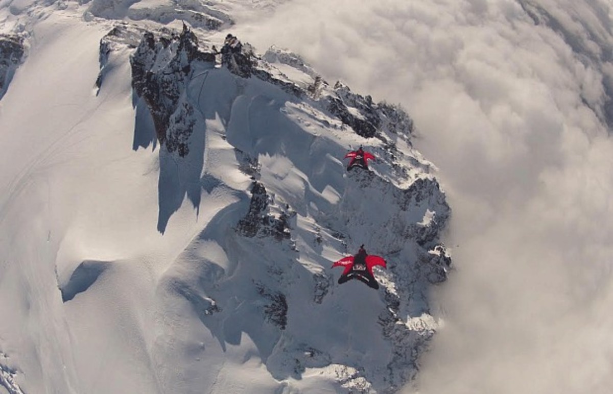 Jokke Sommer and Espen Fadnes fly over the Aiguille du Midi at the Mecca of base jumping, Chamonix. Photo: Wingmen.