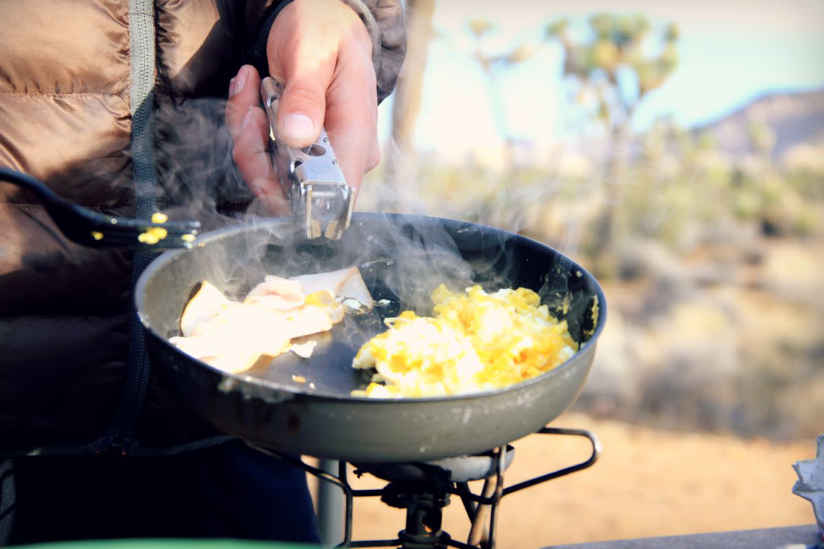 If you're a healthy adult with a loose tolerance for a food's "freshness," you can usually get away with bending the strict USDA/FDA food rules while camping. Photo: Johnie Gall.