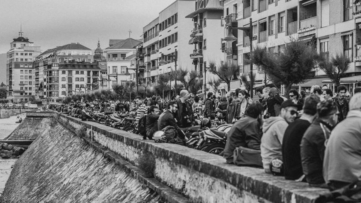 Participants in the Wheels and Waves gather on the seafront in the Basque Country. Photo by Wheels and Waves