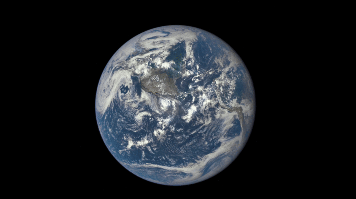 NASA captures an illuminated moon passing the face of Earth. Photo: NASA/NOAA