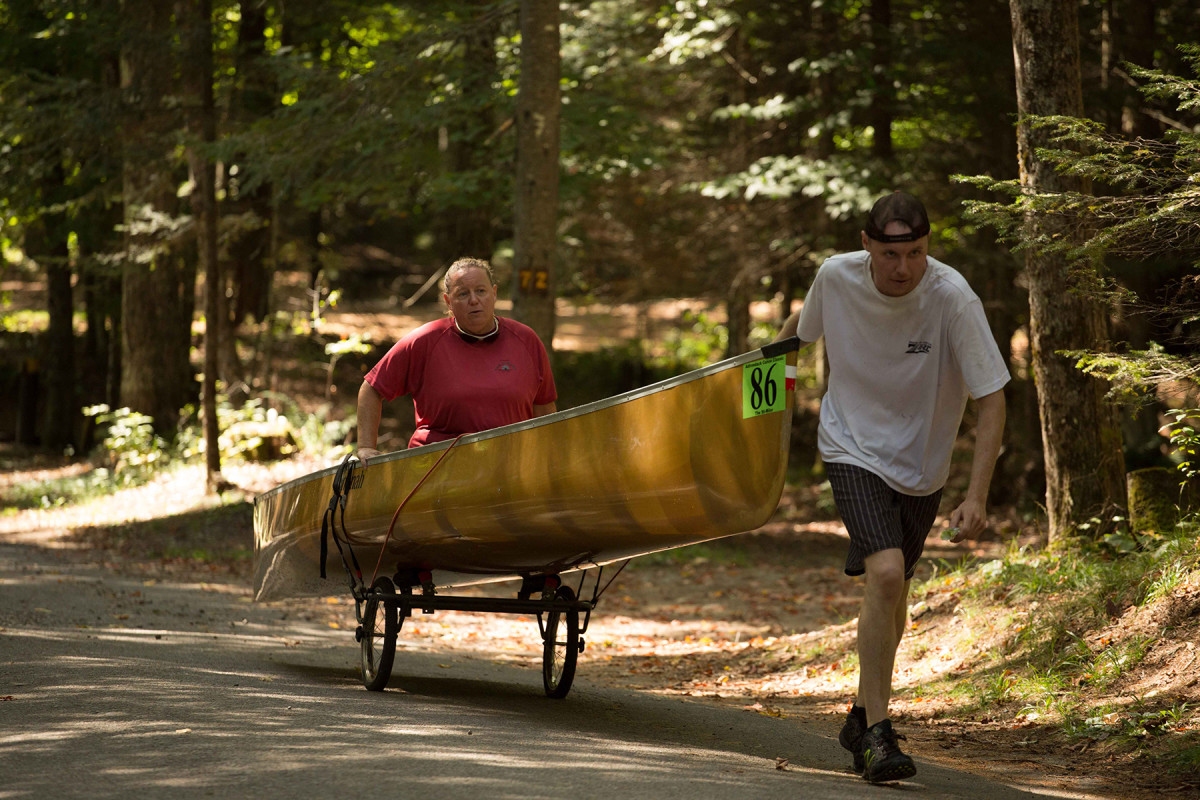 Paddlers race in the 3-day, 90-mile Adirondack Canoe Classic from Old Forge to Saranac Lake in New York state on Friday, September 11.