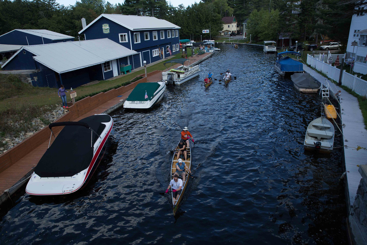 Paddlers race in the 3-day, 90-mile Adirondack Canoe Classic from Old Forge to Saranac Lake in New York state on Friday, September 11.
